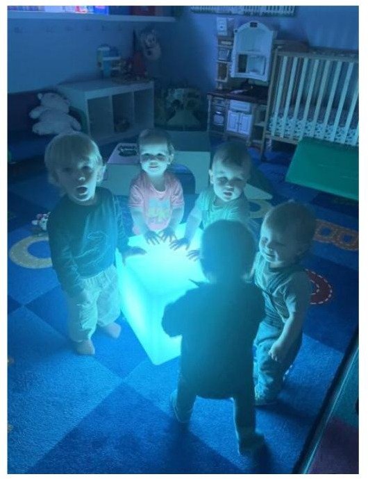 Toddlers with sensory light cube